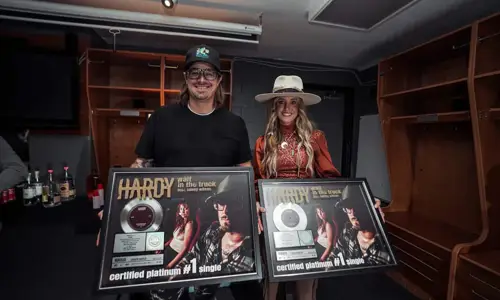 Platinum Surprise: HARDY and Lainey Wilson Receive Plaque For ‘Wait in the Truck’ Ahead Of Tour Kickoff article thumbnail image